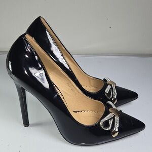 Elegant Black High Heels with Bow Accent